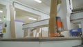 Woodworking CNC machine in a furniture factory. Machine for cutting MDF. Furniture manufacturing process. Laser machine for the