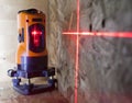 Laser measurement level for construction works, small depth of sharpness Royalty Free Stock Photo