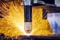Laser or plasma cutting metalworking with sparks Royalty Free Stock Photo