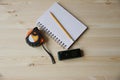 Laser range finder, tape measure, notebook, pencil on a light background Royalty Free Stock Photo