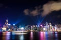 Laser show over Hong Kong cityscape at downtown modern building