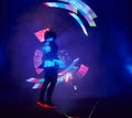 Laser show performance, dancers in led suits with LED lamp, very beautiful night club performance, party Royalty Free Stock Photo