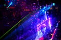 Laser show rays stream. Very colorful show with a crowd silhouette and great laser rays on great afterwork party Royalty Free Stock Photo