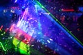 Laser show rays stream. Very colorful show with a crowd silhouette and great laser rays on great afterwork party Royalty Free Stock Photo