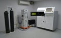 Open working chamber of a laser sintering machine for metal Royalty Free Stock Photo