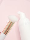 Lash shampoo concept with foam applicator on soft pink background Royalty Free Stock Photo