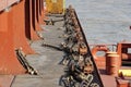 Lashing material, bottom twist-locks and turnbuckles for securing containers on the container vessel to secure containers, Royalty Free Stock Photo