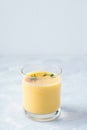 lassi drink mango on a gray concrete background