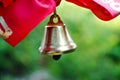 Last call. A bell with a red ribbon. Spring holiday. School years. Graduation. School bells on the background of green