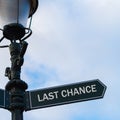 LAST CHANCE directional sign on guidepost Royalty Free Stock Photo