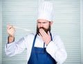 The last details. Healthy food cooking. Bearded man cook in kitchen, culinary. Chef man in hat. Secret taste recipe Royalty Free Stock Photo