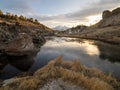 The last evening sunlight reflecting off the hot creek in California Royalty Free Stock Photo