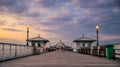 Last golden sunset light over Llandudno Pier in the Victorian seaside resort in North Wales Royalty Free Stock Photo