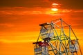 last light of sunset on sky and silhouette ferris wheel