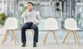 Last in line. Shot of a mature businessman waiting in a office.