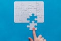 Last piece jigsaw in hand,Concept success of business. Royalty Free Stock Photo