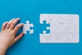 Last piece jigsaw in hand,Concept success of business. Royalty Free Stock Photo