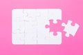 Last piece jigsaw White puzzle Concept success of business Pink background Top view Royalty Free Stock Photo