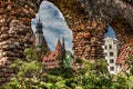 Last post war remains in Gdansk, Danzig, Poland. View through ruins to the old town. Granary Island Royalty Free Stock Photo