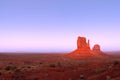 The last rays of the setting sun illuminate famous Buttes of Monument Valley on the border between Arizona and Utah, USA Royalty Free Stock Photo