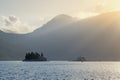 Last rays of the setting sun. Montenegro, Bay of Kotor. View of Island of Our Lady of the Rocks and Island of Saint George