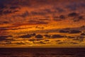 The last seconds of the orange sunset over the ocean Royalty Free Stock Photo