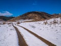 Last snow under the spring sunny sky. Royalty Free Stock Photo