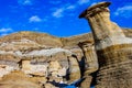 Last snow of the year clings to Hoodoos. Drumheller,Alberta,Canada Royalty Free Stock Photo