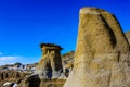 Last snow of the year clings to Hoodoos. Drumheller, Alberta, Canada Royalty Free Stock Photo