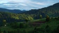 Last sun light on trees at Sunset on Carpathian mountains forests Royalty Free Stock Photo