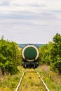 Last wagon cistern on a single track railroad Royalty Free Stock Photo