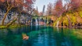 Last warm autumn days in Plitvice National Park. Picturesque autumn scene of pure water lake and waterfalls in Croatia, Europe. Be Royalty Free Stock Photo