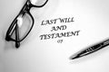Last Will and Testament Glasses and Pen on Desk for Signing Royalty Free Stock Photo