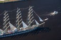 A large sailboat goes along the water area of the Daugava River.nThe last windjammer bark Kruzenstern.