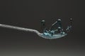 lastic spoon with water drops frozen at high speed showing surface tension and droplet splash structure Royalty Free Stock Photo