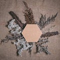 Lasting Faded Sustainable Flowers With Hexagonal Frame On Brown Canvas Background. Composition Of Dried Flowers For Valentine`s