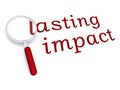 Lasting impact with magnifiying glass Royalty Free Stock Photo