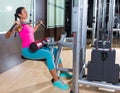 Lat pulldown machine woman workout at gym