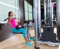 Lat pulldown machine woman workout at gym