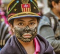 Latacunga, Ecuador - September 22, 2018 - Young men dress in decorated Black Face to celebrate African slave that saved