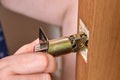 The latch mechanism assembly is inserted into the hole when installing the door handle with the lock