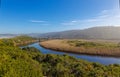 Late afternoon with reflections over a river with reeds near Wildernis, South Africa Royalty Free Stock Photo