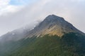 Late afternoon sun highlighting the tree line on a rocky peak, Cerro Alarken Nature Reserve, Ushuaia, Argentina Royalty Free Stock Photo