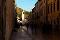 Late afternoon sunset at the main Stradun street in the old town of Dubrovnik, not a lot of people walking the streets during the Royalty Free Stock Photo