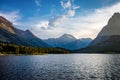 Late afternoon sunset on Swiftcurrent Lake in Many Glacier area of Glacier National Park Montana Royalty Free Stock Photo