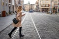 Late again to work. Panning shot of rushing woman running at street Royalty Free Stock Photo