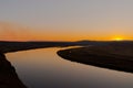 Late autumn sunset grassland near the river Royalty Free Stock Photo