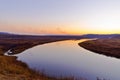 Late autumn sunset grassland near the river Royalty Free Stock Photo