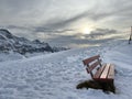 Late evening winter sun over the snow-covered slopes of the Alpstein mountain range and before dusk over massif of the Alps Royalty Free Stock Photo