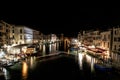 A late night long exposure view of the popular Grand Canal in Venice, taken from the top of the Ponte Rialto Bridge, with a light Royalty Free Stock Photo